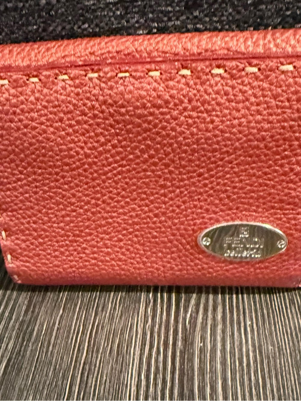 Pebbled Red Leather Wallet with Metal Logo Plate